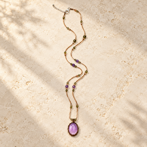 Amethyst Glow handmade cord necklace studio view