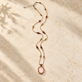 Blush Rose Quartz handmade cord necklace studio view
