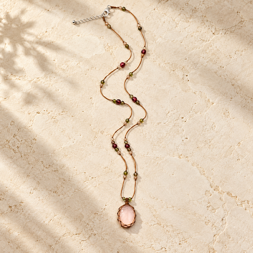 Blush Rose Quartz handmade cord necklace studio view