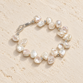 Cloud Petal pearl bracelet on warm ivory stone