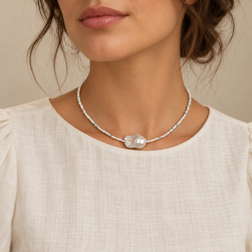 White Tide baroque pearl necklace worn by model