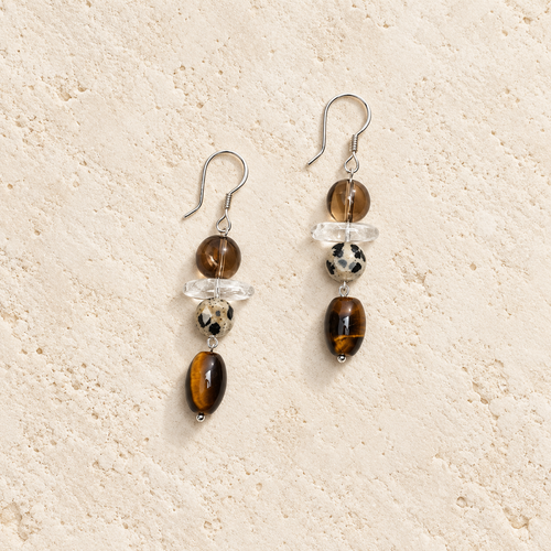 Autumn Spirit crystal and tiger eye earrings on warm ivory stone