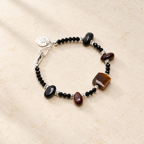 Obsidian Glow tiger's eye and black tourmaline bracelet studio view