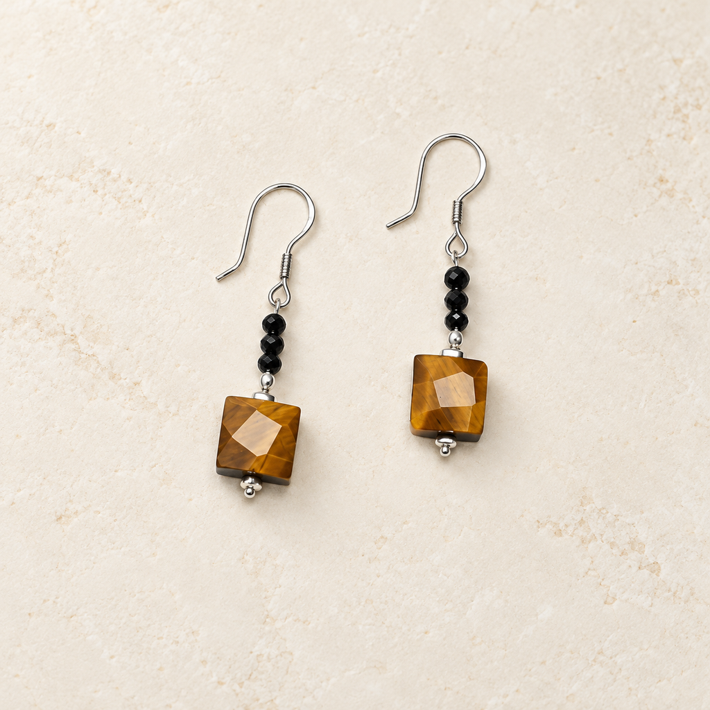 Golden Facet tiger's eye drop earrings studio view